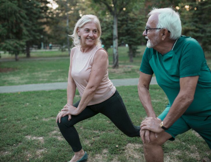 Senior couple of Caucasian ethnicity, enjoying themselves, being physically active outdoors, training and leading a healthy lifestyle in their old age